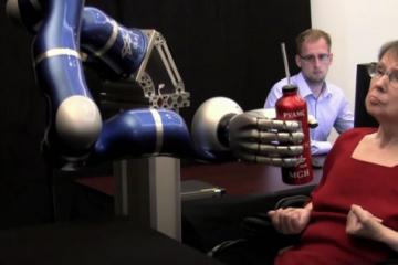 Paralyzed Woman Controls Robotic Arm with Thoughts